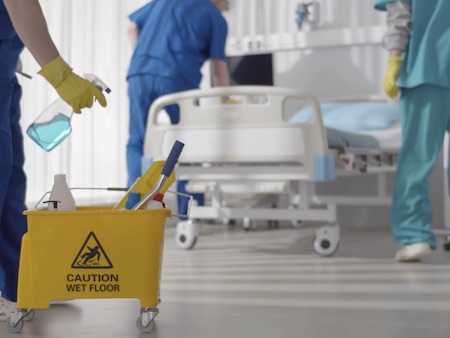 Medical Staff Doing Disinfection And Cleaning in Intensive Care Unit of Clinic. Medical waste management